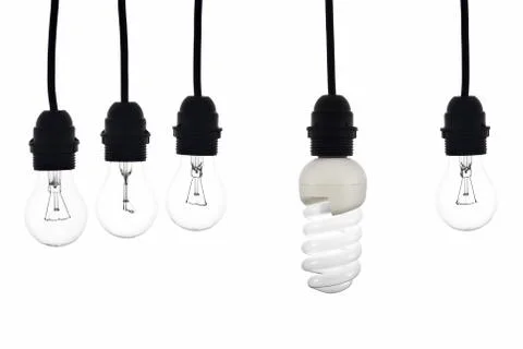 A light bulb with low consumption light bulbs hanging between Stock Photos