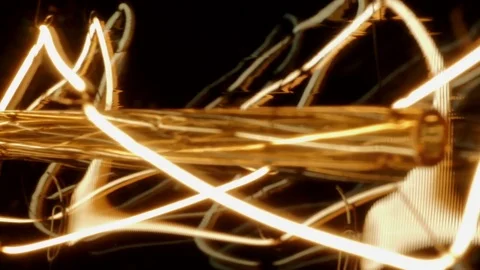 Light Bulb In Macro On Black Background Stock Footage 74687977