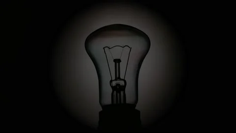 Light Bulb In Macro On Black Background Stock Footage 90020806