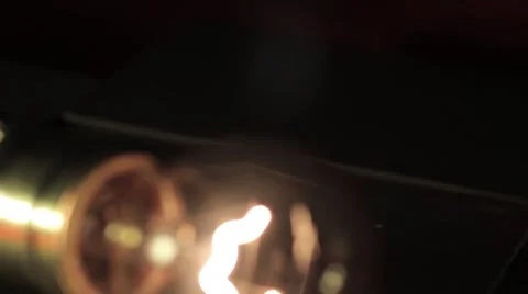 Light Bulb macro dolly filament on 2 Stock Footage 2518451