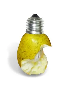 Light bulb made from bitten off green pear isloated on white background. Alte Stock Photos