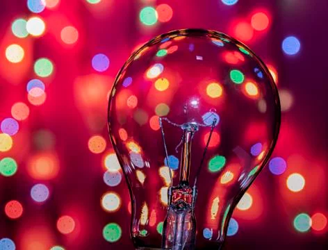 Light bulb on multicolored lights background, I have an idea !! Foto stock