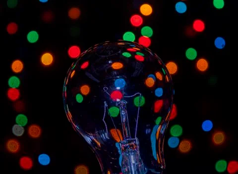 Light bulb on multicolored lights background, I have an idea !! Foto stock