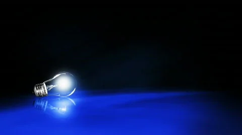 Light Bulb on a Reflective Floor Stock Footage 377525