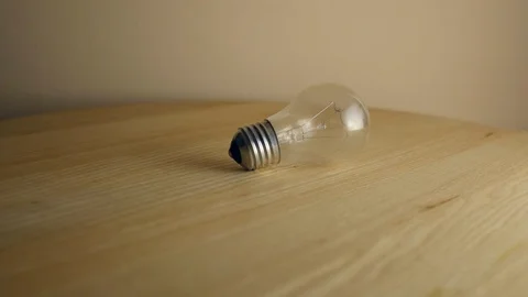 Light bulb on a rotating table. Stock Footage 125078829