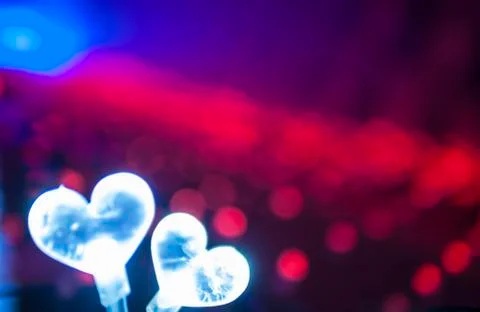 Light bulb in the shape of heart Stock Photos