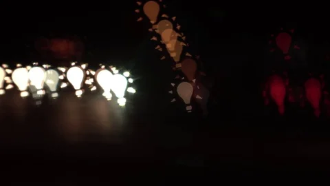 Light bulb shaped bokeh of car lights at night. Stock Footage 80723682