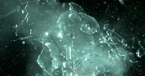Light Bulb Shatters Macro Stock Footage 77781421