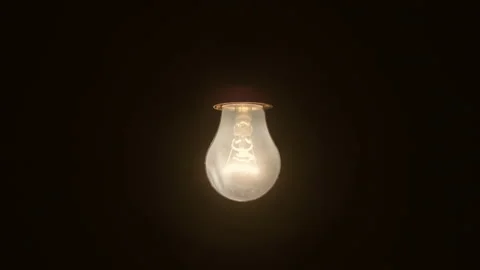 Light bulb slowly turned on and off on black background. Stock Footage 227519207