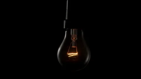 Light bulb swinging to camera . 4k Stock Footage 89648900