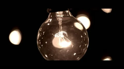 Light Bulb Swinging Stock Footage
