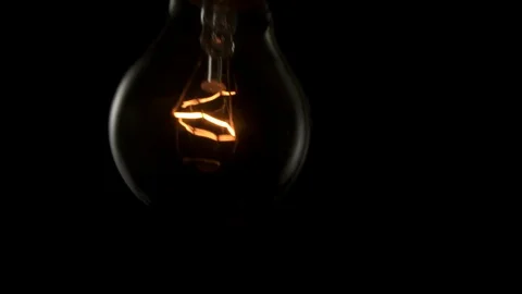 Light bulb swinging. Slow motion 4k Stock Footage 89648970