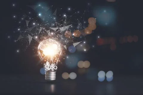 The light bulb is on the table,for Concept new idea, concept with innovatio.. Stock Photos