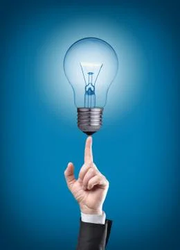 Light bulb on tip of finger on businessman Stock Illustration