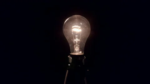 Light bulb Turning on 4K Stock Footage 149804003