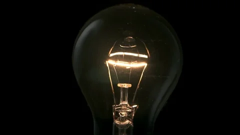 Light bulb turning on and off. 4k Stock Footage 89648979