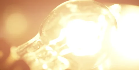 Light bulb turning off in slow motion - Vintage Bulb Stock Footage 51811249