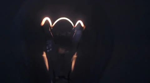 Light Bulb Turns on Slowly Stock Footage 8688070