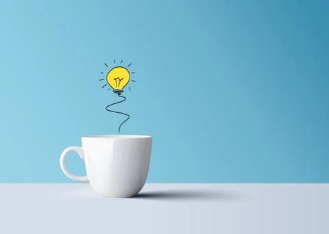 Light bulb in white coffee mug, creative idea Stock Photos