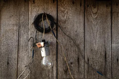 Light bulb without light in countryside. Stock Photos
