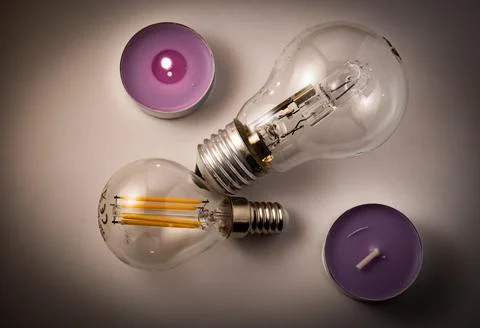 Light bulbs and candlesticks Stock Photos