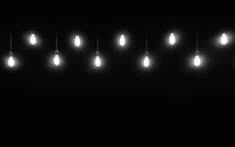 Light bulbs on black background Stock Photos