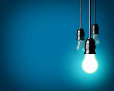 Light bulbs on blue background Stock Photos