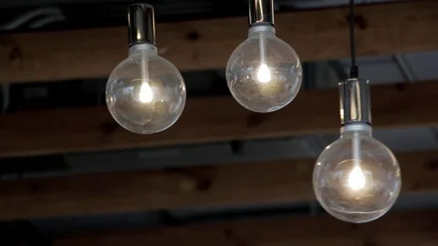 Light bulbs electricity current Stock Footage 98677341