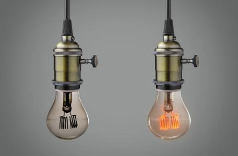 Light bulbs on gray background Stock Photos