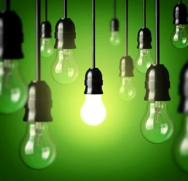 Light bulbs on a green background.idea concept. Stockfoto's