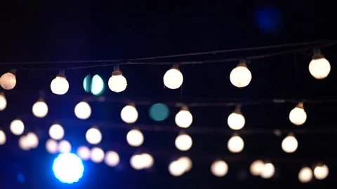 Light bulbs in night Stockbeeldmateriaal 194425891