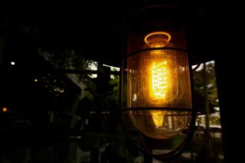 Light bulbs, orange light, open for illumination in cafes. Stock Photos