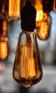 Light bulbs with orange light Stock Photos