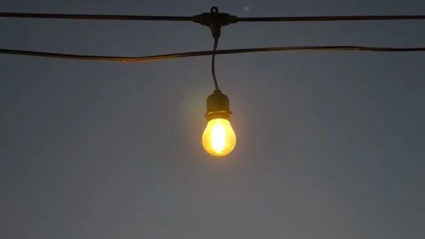 Light bulbs serve as lighting and accessories in aesthetic hangouts or Stock Footage 341660593
