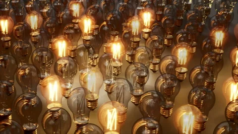 Light Bulbs Start To Lit Among Array Of Glass Bulbs. 動画素材 96039202