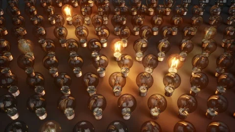 Light Bulbs Start To Lit Among Array Of Glass Bulbs. 動画素材 96045482