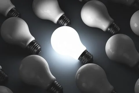 Light bulbs on the surface. One of the light bulbs is on. Foto stock