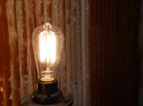 Light bulbs turn on Stock Photos