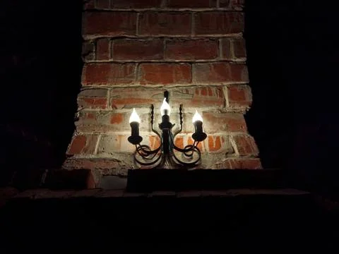 Light bulbs on a wall Stock Photos