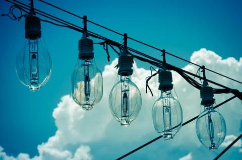 Light bulbs on a wire Stock Photos