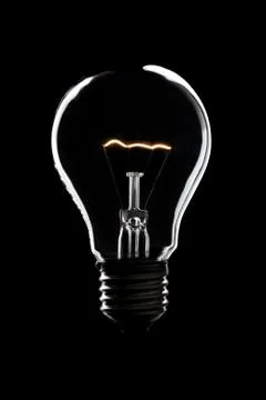 Light bulp buring in the night Stock Photos