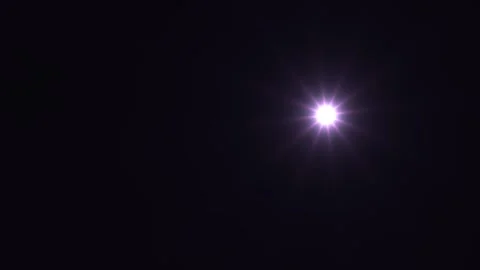 Light burst effect with star pattern against dark Stock Footage 338393685