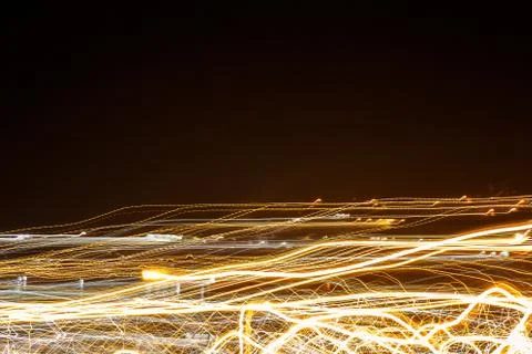 Light from the camera movement at night. Fotos Stock