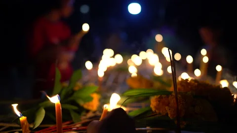 Light of candle of Buddhist Lent Day activity in countryside in Thailand on nigh 스톡 동영상 140378746