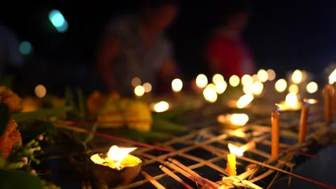 Light of candle of Buddhist Lent Day activity in countryside in Thailand on nigh Stock Footage 140379008