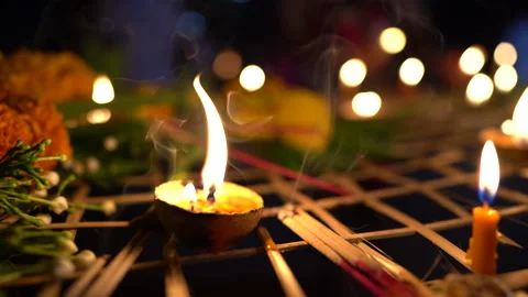 Light of candle of Buddhist Lent Day activity in countryside in Thailand on nigh 動画素材 140379218