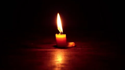 Light candle burning brightly,Candle light close up on black background. Burning 스톡 동영상 196683489