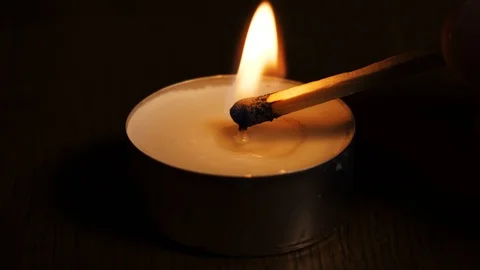 Light a candle in the dark Stock Footage 104127267