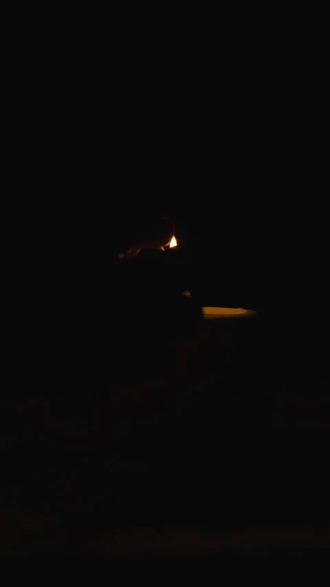 LIGHT CANDLE MATCH BOX IN HAND VERTICAL 4K C1709 Stock Footage 335651314