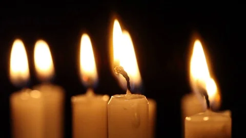 Light a candle with a match Stock Footage 83347463
